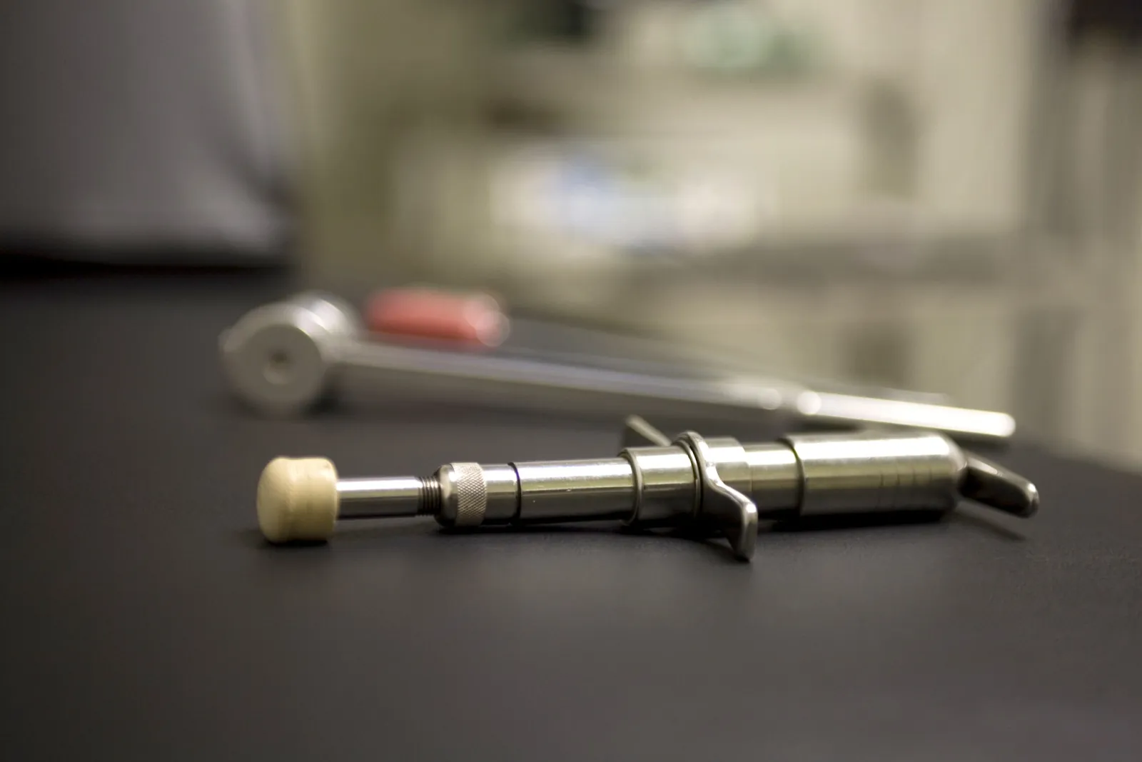 Chiropractic activator instrument on a desk